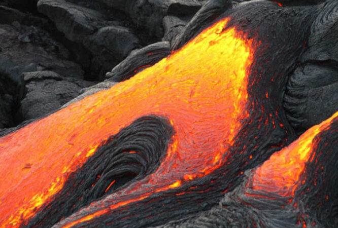 Volcanic Lava flowing from an erupting volcano